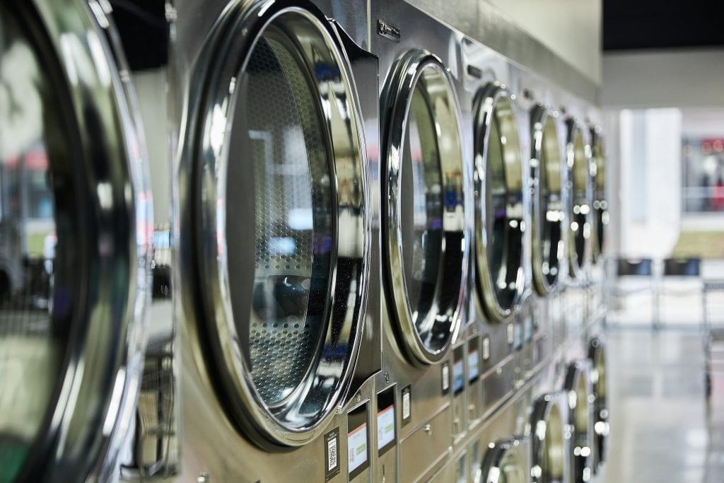 Illustration of coin operated laundromat machines